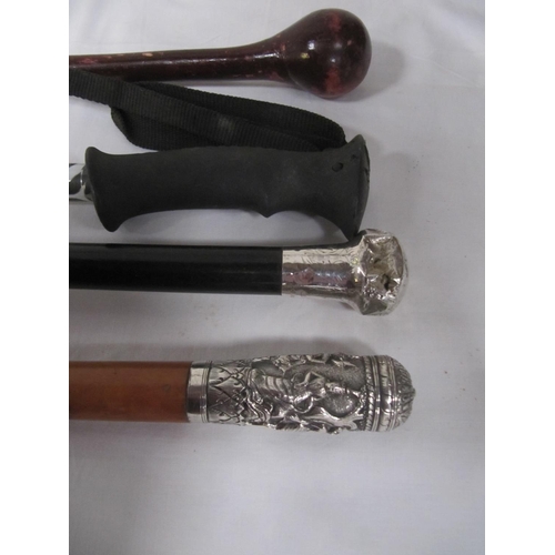 142 - Four Walking Canes to Include Silver Hallmarked Topped Cane.