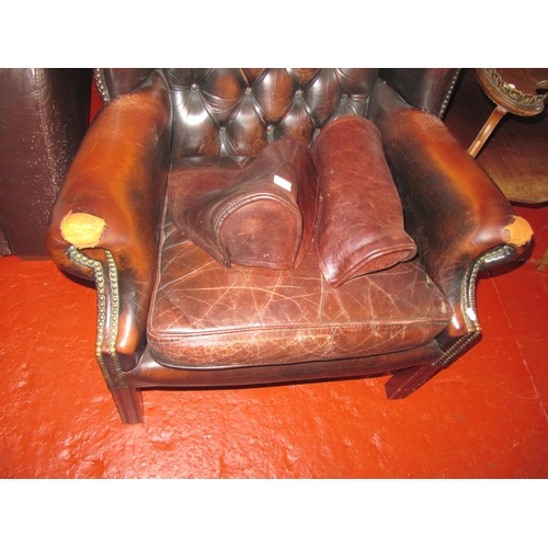 709 - Brown Leather Button Backed Chesterfield Style Arm Chair - has wear to arm ends.