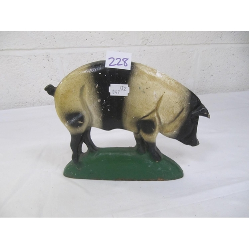 228 - Cast Pig Door Stop.