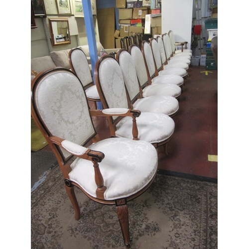 506 - Set of 10 Yew with Cream Upholstered Seat Dining Chairs and Two Matching Carvers.