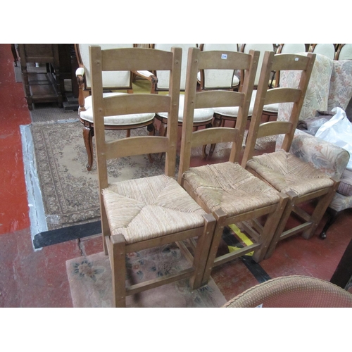 509 - Three Wicker Seated Solid Pine High Back Chairs.