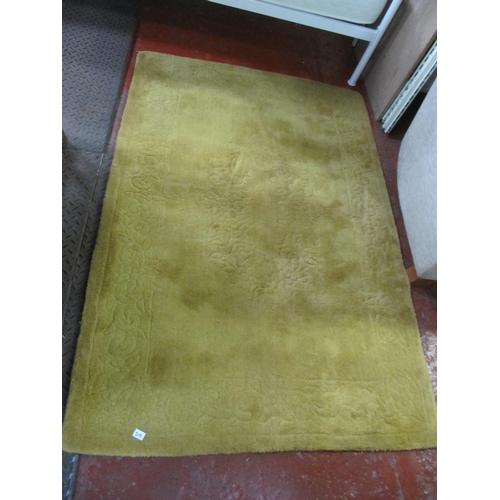 519 - Mustard Coloured Thick Indian Rug - approx 120cm x 176cm.