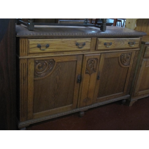 565 - Solid Carved Oak Two Drawer, Two Door Sideboard.