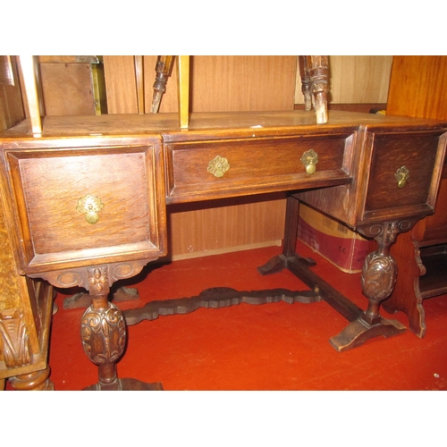 587 - Leather Inlay Topped Oak Desk on Carved Pineapple Legs with Three Drawers.