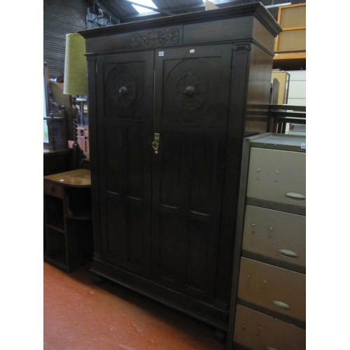 636 - Carved Dark Oak Two Door Hallrobe.