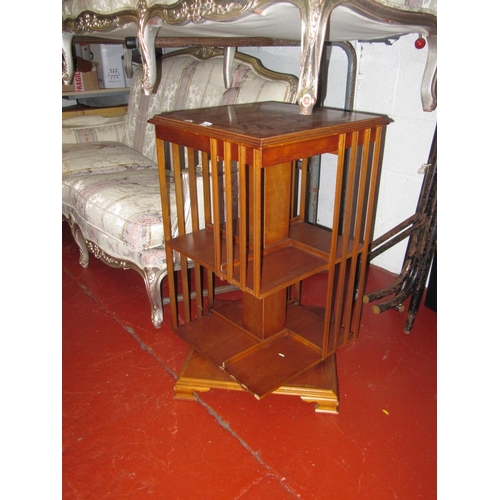 679 - Inlaid Yew Revolving Bookcase.