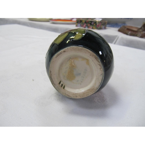 422 - Moorcroft Green Ground Clematis Baluster Vase with Remnants of Paper Label c.1970’s.