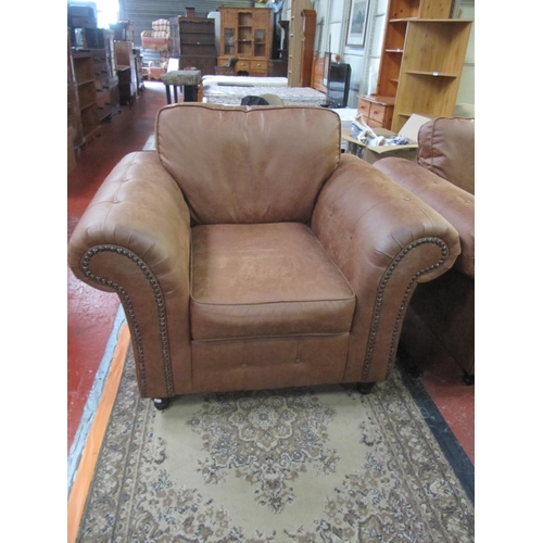 507 - Pair of Large Brown Suede Arm Chairs with Button Arms.