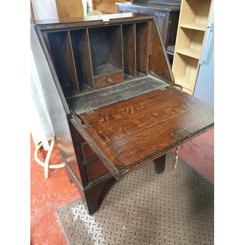 532 - Solid Oak Drop Front Writing Bureau over Three Drawers with Key.
