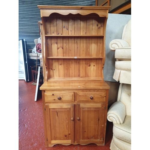 540 - Solid Pine Closed Back Double Dresser with Two Drawers & Double Cupboard.