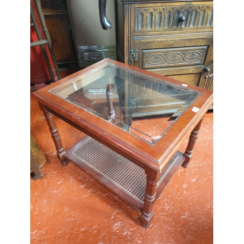 544 - Mahogany Glass Topped Coffee Table with Woven Undershelf.