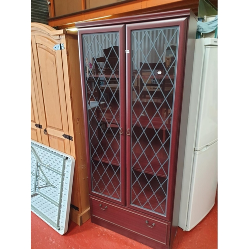 530 - Modern Two Door Glazed 4 Shelf Mahogany Bookcase over Single Drawer.