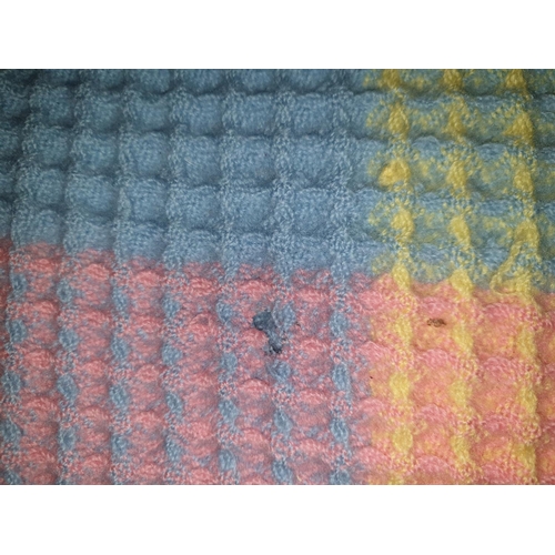 26 - Pastel Rainbow Coloured Welsh Honeycomb Blanket - small hole.