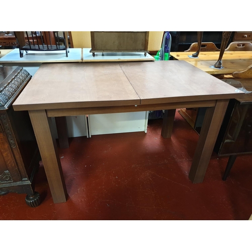 583 - Oak Effect Fold Out Extending Dining Table.