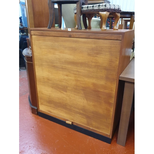 586 - Roller Front Office Cabinet with Metal Inner Shelves & Dividers.