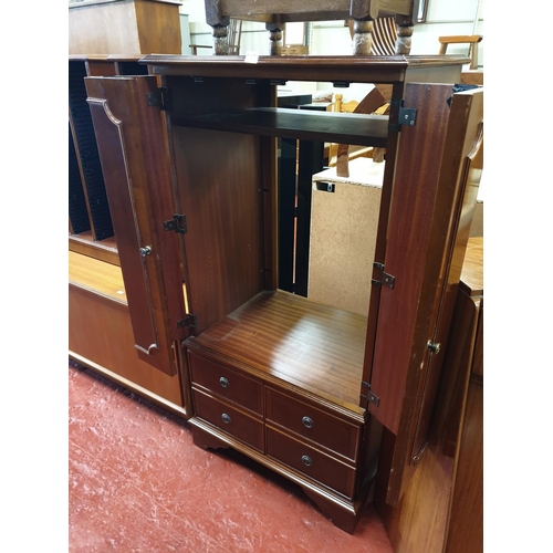 602 - Yew HiFi Cabinet with Bifold Doors over Two Cupboards.