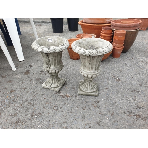 697 - Pair of Small Grecian Style Concrete Garden Urns.