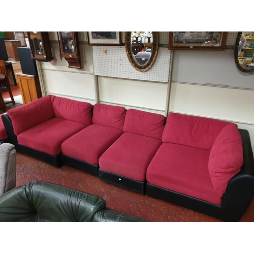 473 - Large 6 Seater Red Upholstered & Black Leather Sofa with Matching Pouffe.