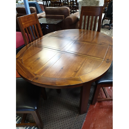 493a - Stunning Extendable Circular Dining Table with 4 Matching Chairs.