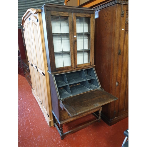 511 - Solid Oak Glazed Top Bureau Bookcase Over Two Drawers.