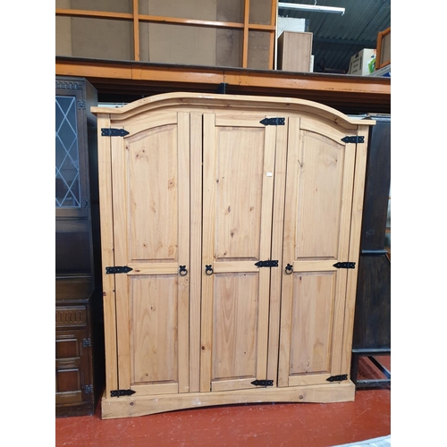 512 - Solid Pine Triple Wardrobe with Hanging Rail & Shelves.