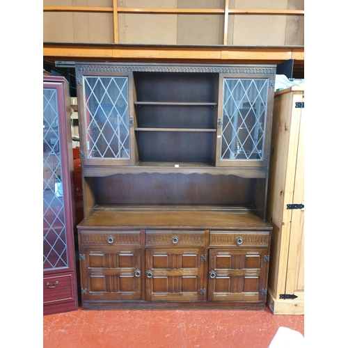 513 - Priory Oak Glazed Top Triple Dresser.