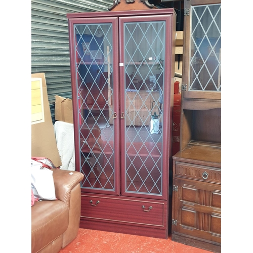 514 - Modern Two Door Glazed Mahogany Effect Bookcase over Single Drawer.