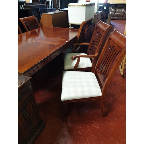 527 - Large Extending Inlaid Mahogany Dining Table, 4 Chairs and 2 Carvers.