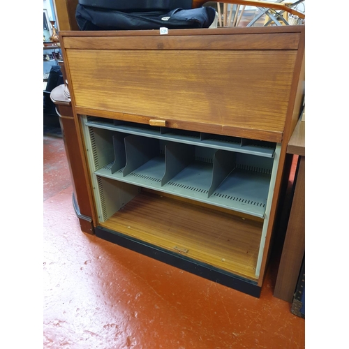 538 - Roller Front Office Cabinet with Metal Inner Shelves & Dividers.