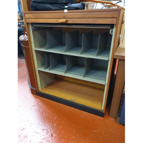 538 - Roller Front Office Cabinet with Metal Inner Shelves & Dividers.