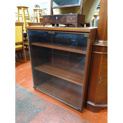 541 - Two Door, Three Shelf Glazed Bookcase.