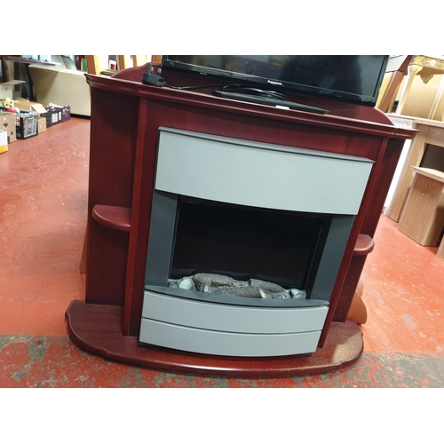 587 - Modern Flame Effect Electric Fire & Mahogany Surround.