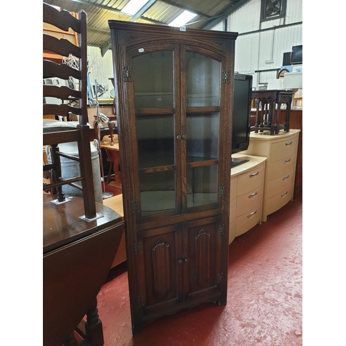 595 - Dark Oak Glazed Top Corner Cabinet.