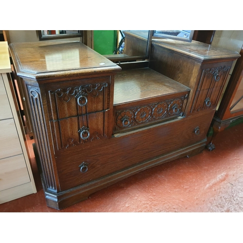 598 - Oak Linen Fold Triple Mirror Topped Dressing Table with Six Drawers.