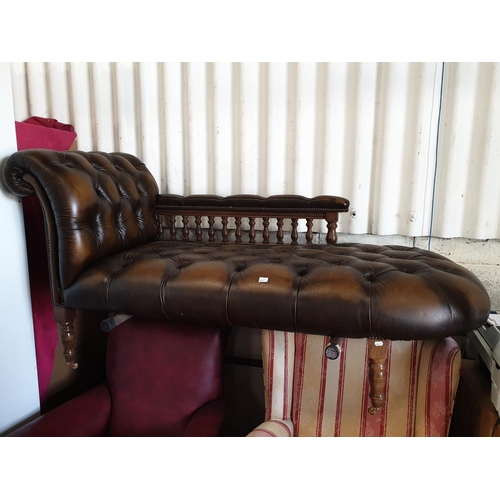 607 - Oak Framed Brown Leather Buttoned Chaise Longue with Brass Casters.