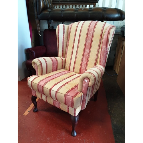 608 - Pink & Cream Upholstered Wing Back Arm Chair.