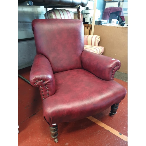 609 - 1930's Red Rexene Upholstered Library Chair with Casters.