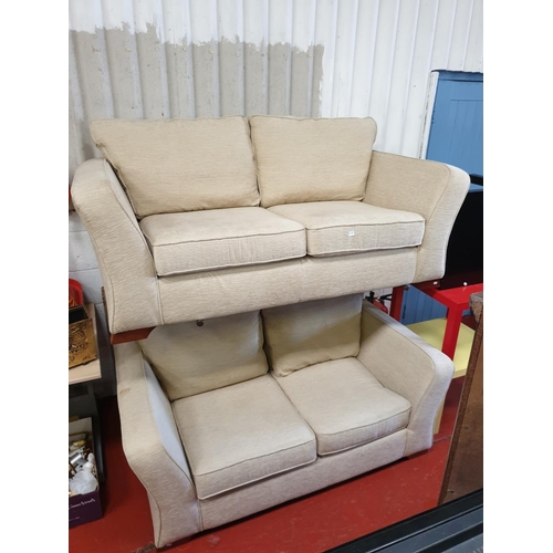 616 - Two Modern Oatmeal Coloured Upholstered 2 Seater Settees.