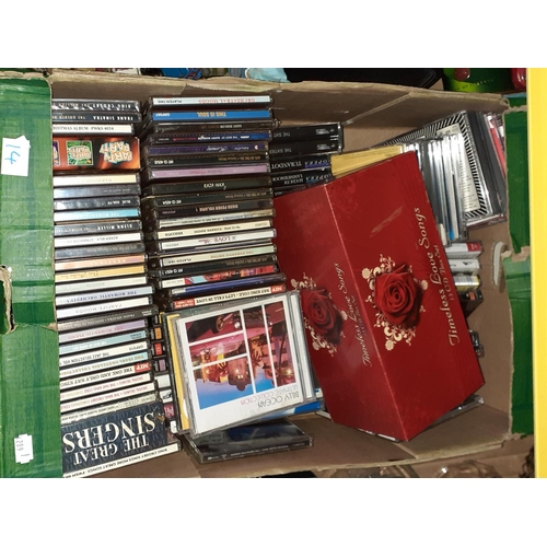 14 - Box of Assorted CD's & Cassette Tapes.