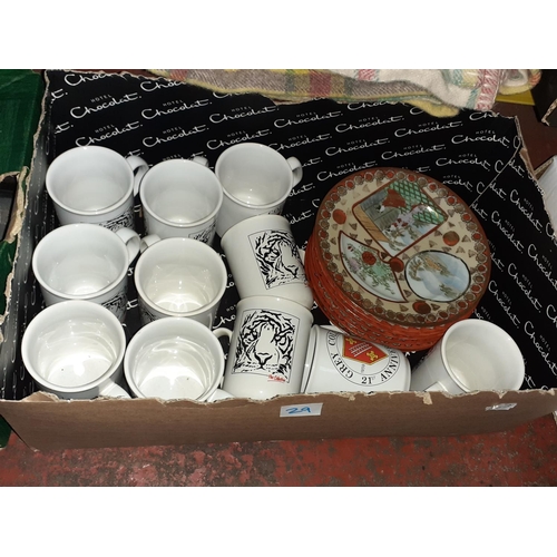 29 - Box of Mugs & Oriental Plates.