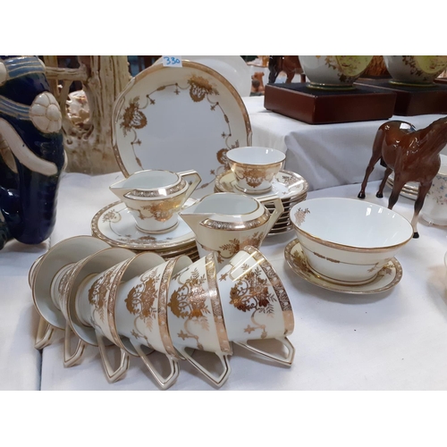 330 - 25 Piece Cream, White & Gilt Noritake Part Tea Set.