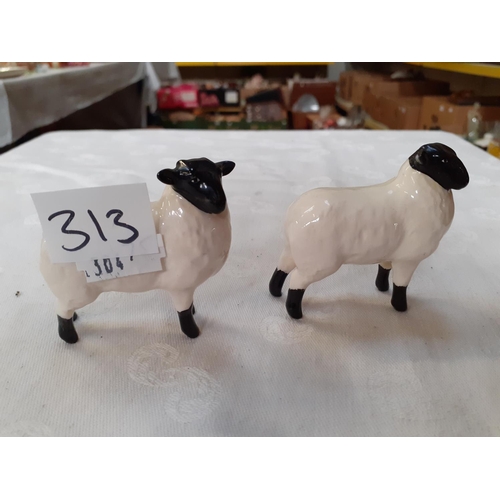 313 - 2 Beswick Black Faced Sheep - One has ear missing.