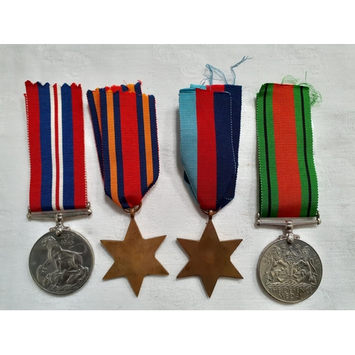 419 - Four World War II Medals - no side markings.