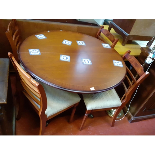 564 - Yew Extending Circular Dining Table and 4 Chairs.