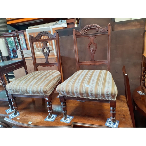 573 - Pair of Mahogany Bedroom Chairs on Casters.