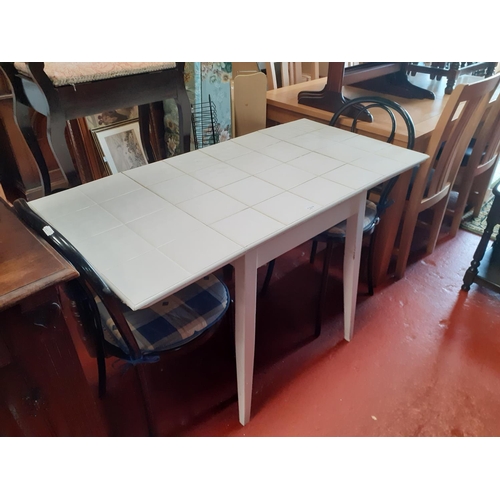 584 - Tiled Top Kitchen Table and 2 Metal Chairs.