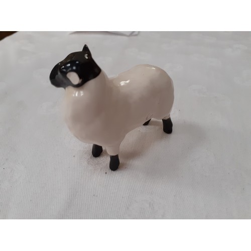 313 - 2 Beswick Black Faced Sheep - One has ear missing.