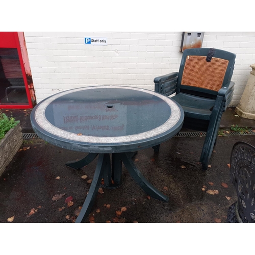 704 - Green Circular Garden Table and 4 Stacking Chairs.