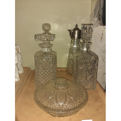 306 - Cut Glass Decanters, Lidded Cut Glass Bowl & Claret Jug.