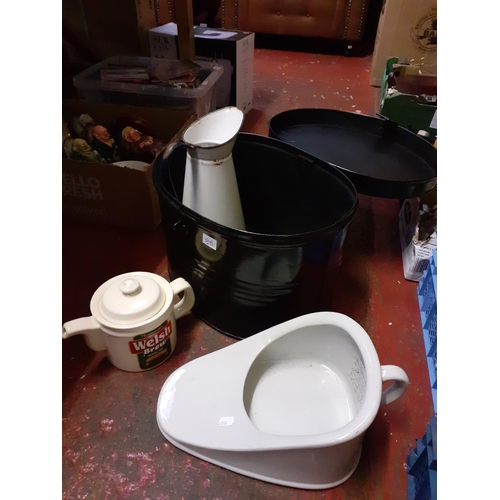 86 - Oval Metal Storage Trunk, Bed Slipper, Teapot and Enamel Jug.